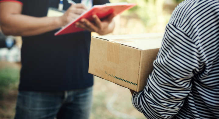 Close up woman holding box with Service delivery and holding a b